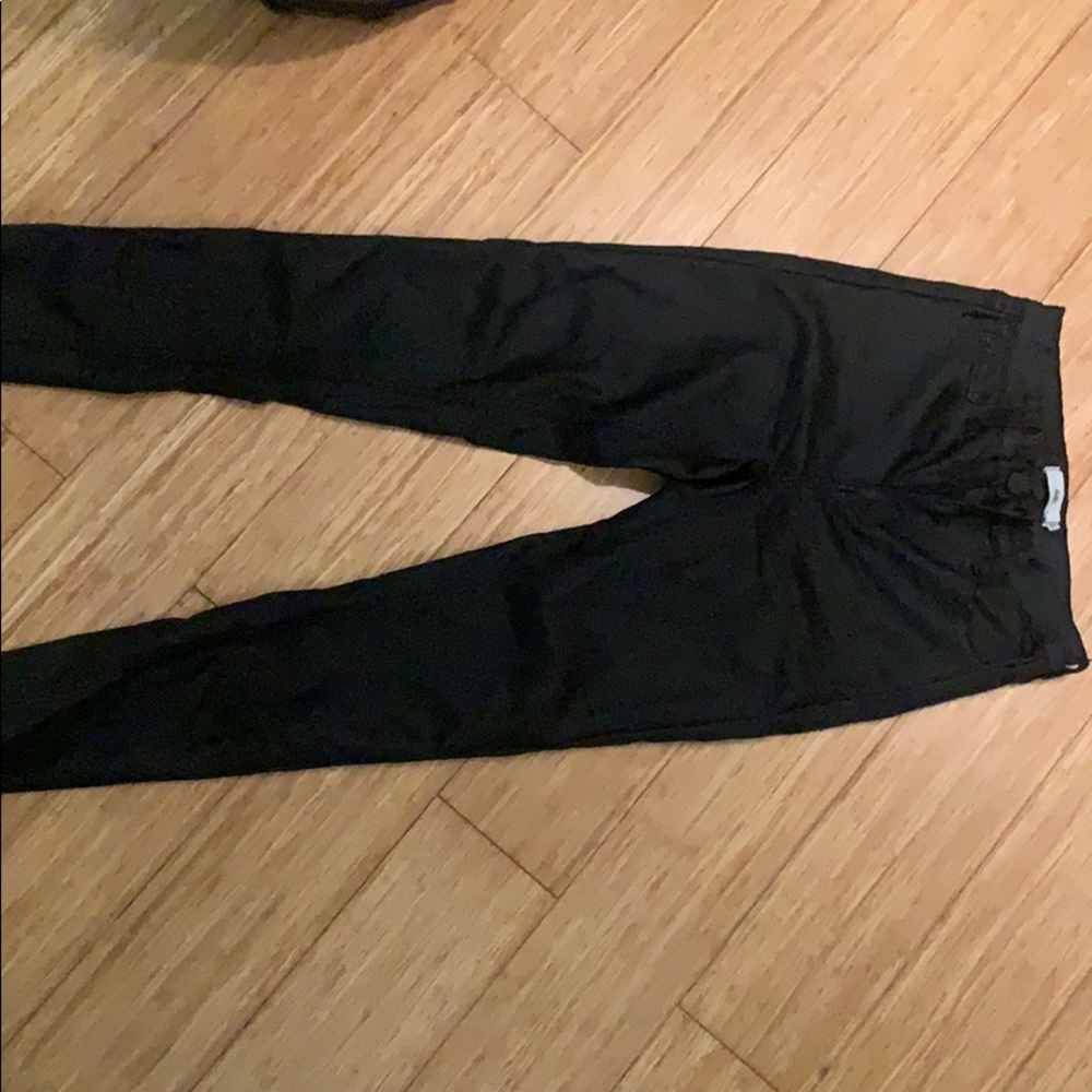 NEVER OPENED. Shiny black jegging “leather” pant